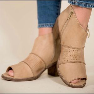 Roan “Katherine” peep toed booties.  Super fun and cute, my feet are too fat.